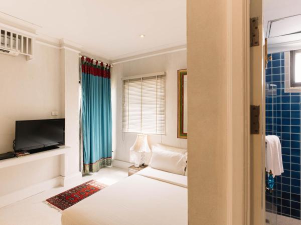 At Niman : photo 10 de la chambre 2 bed room king size bed and queen size bed