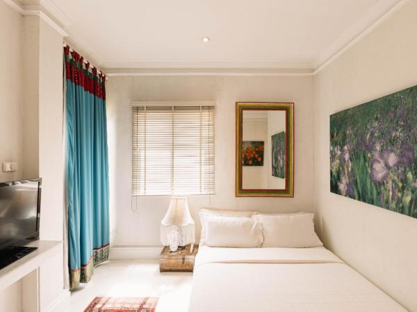 At Niman : photo 9 de la chambre 2 bed room king size bed and queen size bed