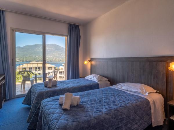 Hotel Hibiscus : photo 1 de la chambre chambre lits jumeaux - vue sur mer
