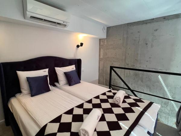 NEON APARTMENTS : photo 1 de la chambre appartement en duplex