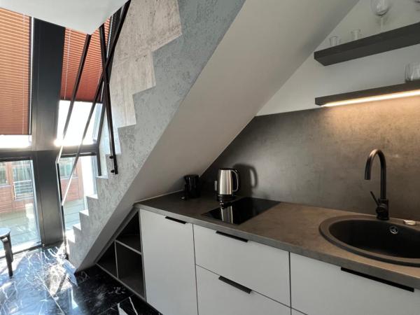 NEON APARTMENTS : photo 8 de la chambre appartement en duplex