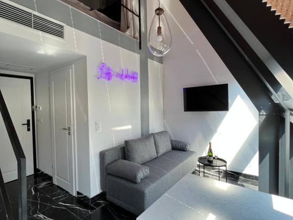 NEON APARTMENTS : photo 3 de la chambre appartement en duplex