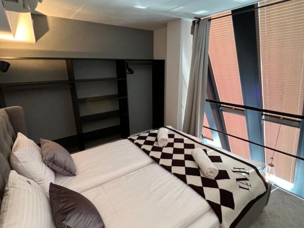 NEON APARTMENTS : photo 5 de la chambre appartement en duplex