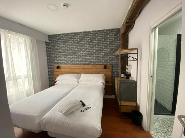 Casual Mardones : photo 5 de la chambre chambre lits jumeaux avec salle de bains privative