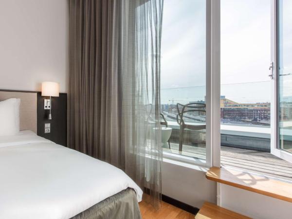 Radisson Blu Hotel Uppsala : photo 1 de la chambre chambre standard avec balcon - vue sur ville