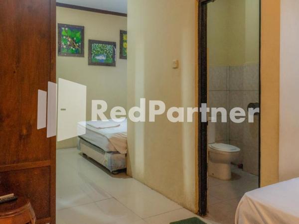 Vandhela Homestay Syariah Mitra RedDoorz : photo 3 de la chambre chambre familiale