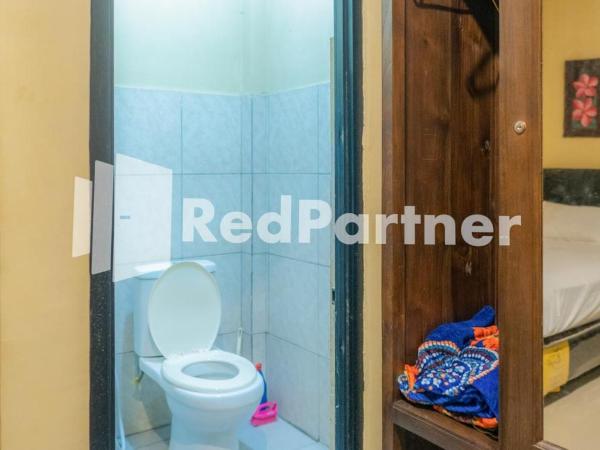 Vandhela Homestay Syariah Mitra RedDoorz : photo 4 de la chambre chambre double standard