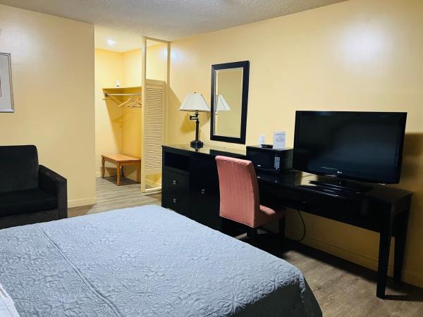 Sunset Inn : photo 4 de la chambre suite lit queen-size