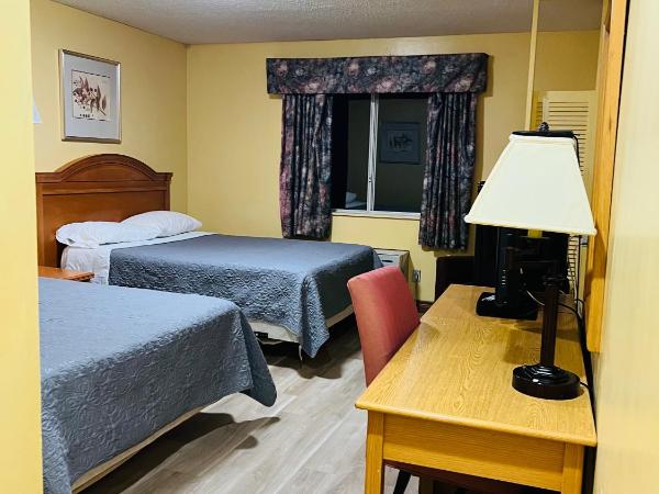 Sunset Inn : photo 1 de la chambre chambre standard avec 2 lits doubles-fumeurs 