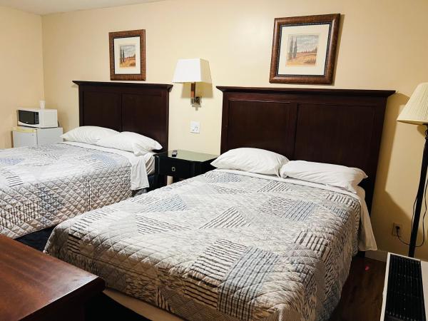 Sunset Inn : photo 3 de la chambre chambre double familiale