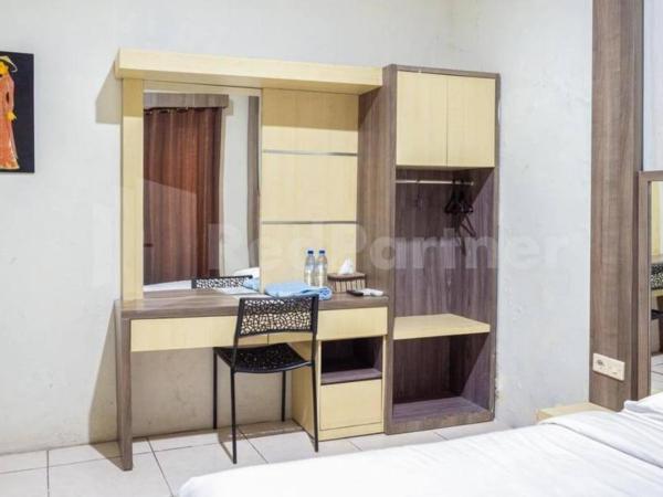 My Hommy Homestay Mitra RedDoorz : photo 4 de la chambre chambre double standard