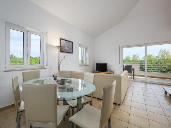 Adria Apartments : photo 3 de la chambre appartement en duplex