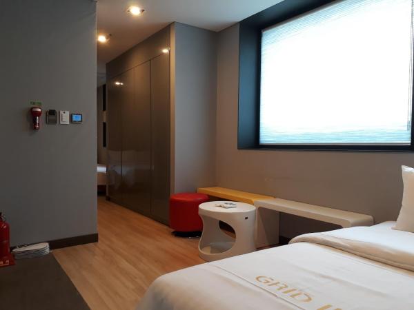 Grid Inn Hotel : photo 6 de la chambre chambre familiale standard