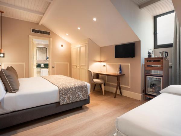 Catalonia Las Cortes : photo 4 de la chambre chambre triple