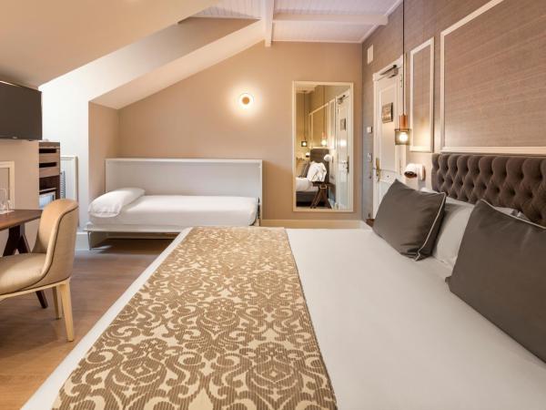 Catalonia Las Cortes : photo 2 de la chambre chambre triple