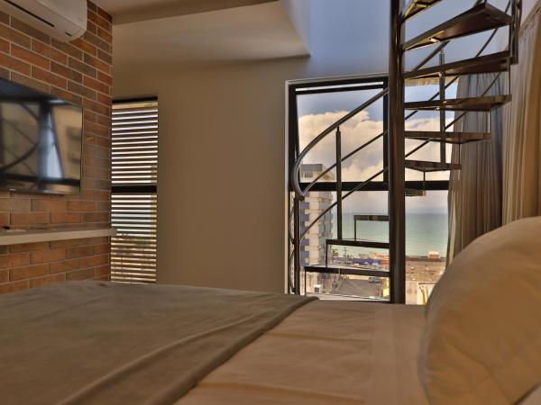 Reserva Madero Loft Natal : photo 9 de la chambre penthouse