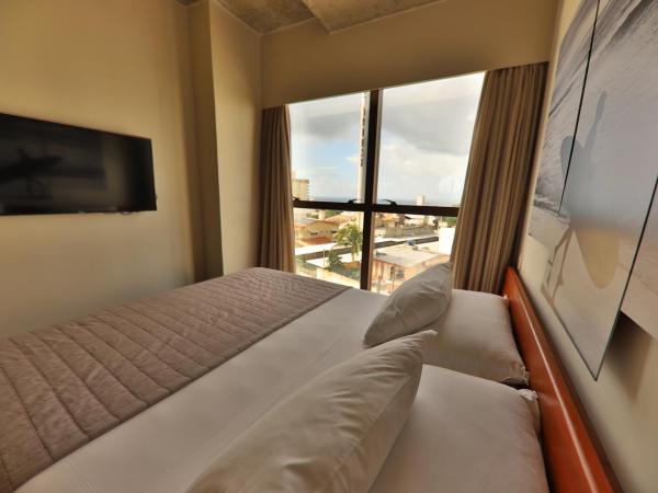 9006 Suites Natal Vista Mar : photo 5 de la chambre suite deluxe - vue sur mer