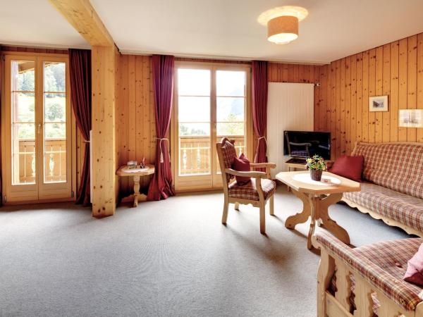 Hotel Alpenrose Wengen - bringing together tradition and modern comfort : photo 1 de la chambre appartement quadruple - vue sur montagne