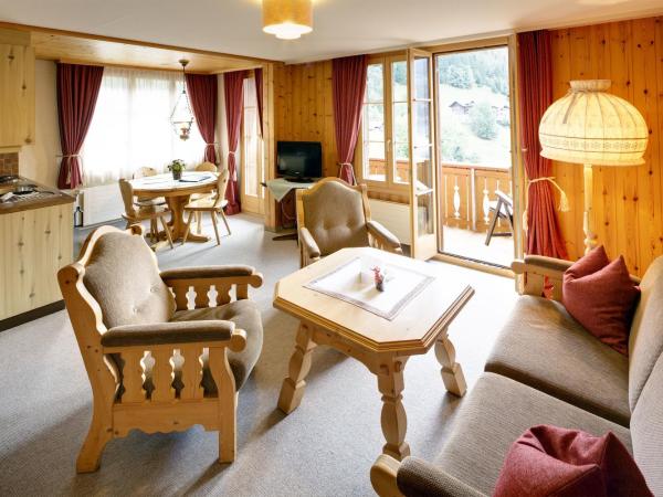 Hotel Alpenrose Wengen - bringing together tradition and modern comfort : photo 1 de la chambre appartement triple - vue sur montagnes