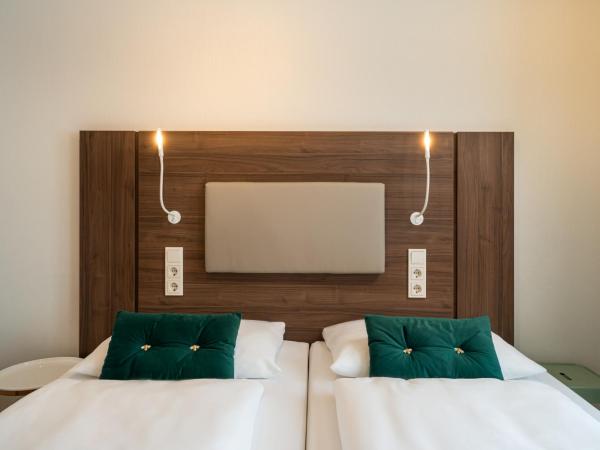 Arthotel ANA Liberty Bremen City : photo 1 de la chambre petite chambre double