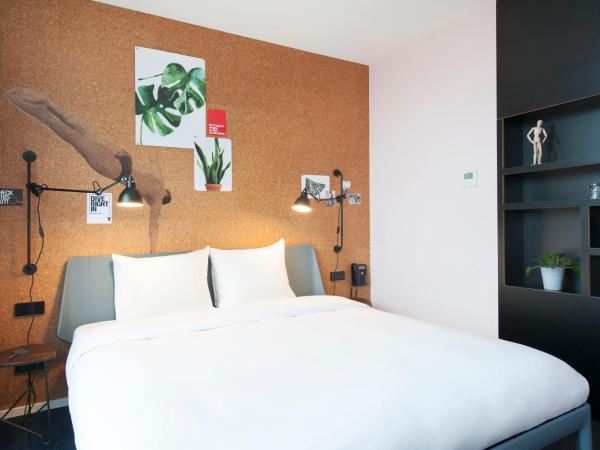 Conscious Hotel Amsterdam City - The Tire Station : photo 2 de la chambre  grande chambre double Écologique