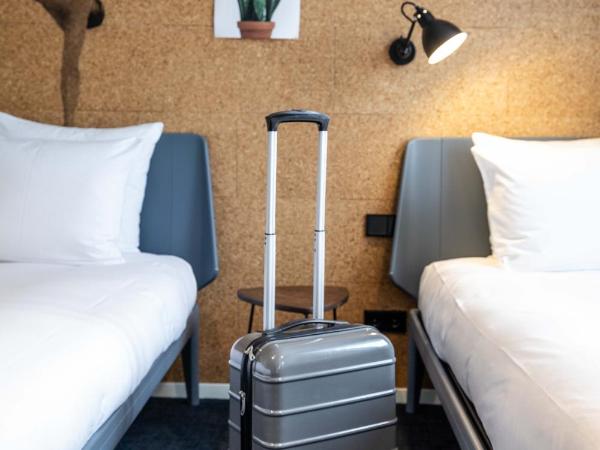 Conscious Hotel Amsterdam City - The Tire Station : photo 1 de la chambre chambre lits jumeaux Écologique