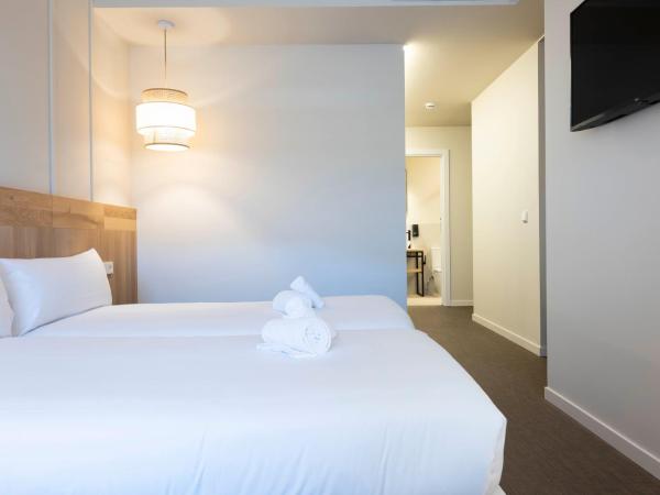 URBAIA ROOMS : photo 2 de la chambre chambre double ou lits jumeaux