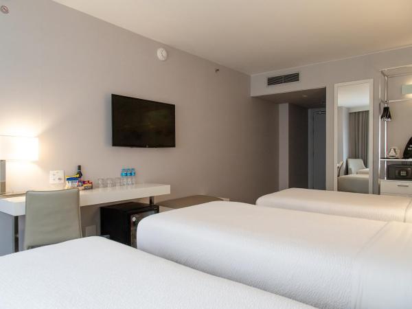 Radisson Rio de Janeiro Barra : photo 5 de la chambre chambre triple supérieure avec 3 lits simples