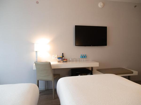 Radisson Rio de Janeiro Barra : photo 9 de la chambre chambre triple supérieure avec 3 lits simples