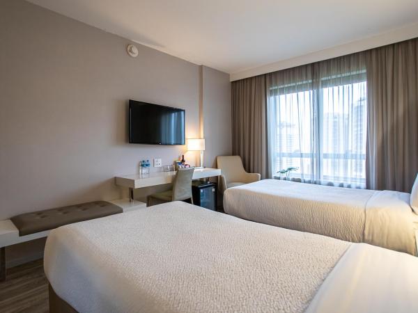 Radisson Rio de Janeiro Barra : photo 6 de la chambre chambre lits jumeaux supérieure