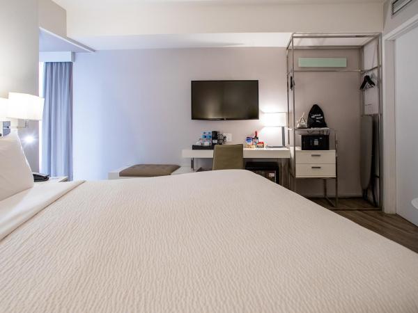 Radisson Rio de Janeiro Barra : photo 7 de la chambre chambre lit king-size de luxe