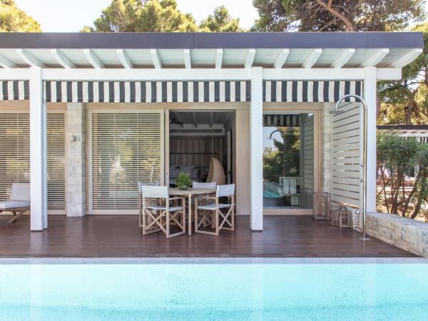 Four Seasons Astir Palace Hotel Athens : photo 7 de la chambre suite bungalow avec piscine - vue sur jardin
