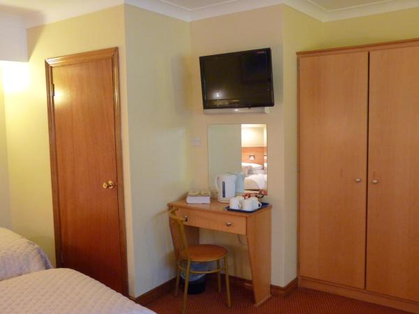 Holiday Hotel : photo 10 de la chambre chambre triple