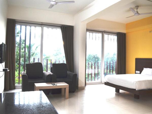 Grand Suites Yelahanka : photo 4 de la chambre chambre double deluxe avec balcon