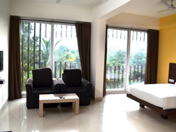 Grand Suites Yelahanka : photo 3 de la chambre chambre double deluxe avec balcon