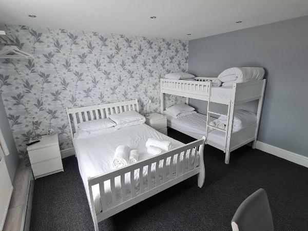 Queens Plaza Hotel : photo 6 de la chambre chambre quadruple