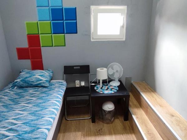 Tetris Sopot : photo 1 de la chambre chambre simple avec salle de bains commune