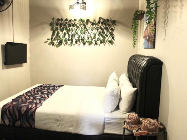 Ghazrin's Garuda Hotel : photo 6 de la chambre chambre double
