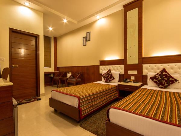 Hotel Aster Inn New Delhi : photo 1 de la chambre chambre deluxe