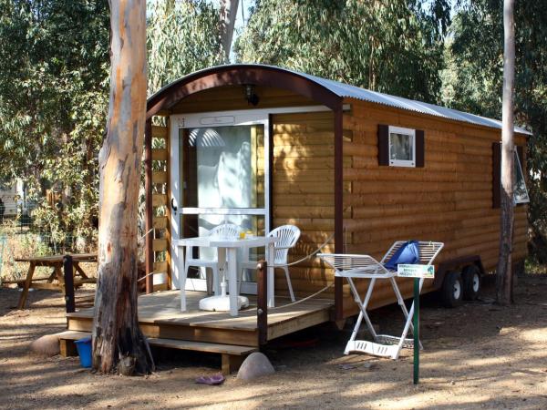 Camping La Pinède : photo 3 de la chambre roulotte agriate