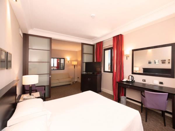 Hotel Regina Margherita : photo 4 de la chambre chambre quadruple