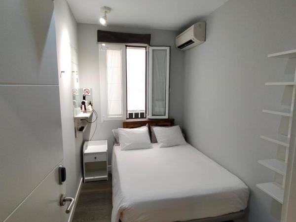 diezmadrid : photo 3 de la chambre chambre double ou lits jumeaux avec salle de bains commune