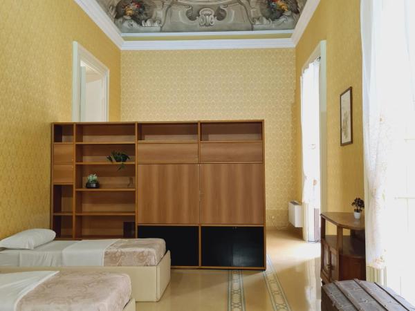 Salerno Experience HOSTEL- Age Limit 18-35 : photo 1 de la chambre lit superposé dans dortoir pour femmes 