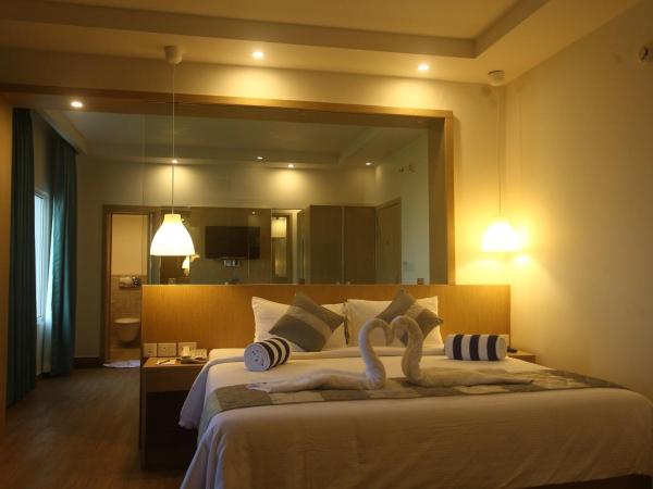 Ginger Kochi MG Road : photo 5 de la chambre executive suite with one bed room