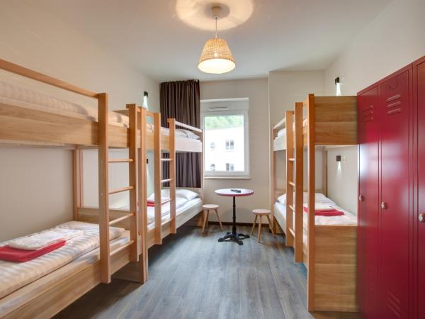 MEININGER Hotel Salzburg City Center : photo 1 de la chambre hébergement 6 lits