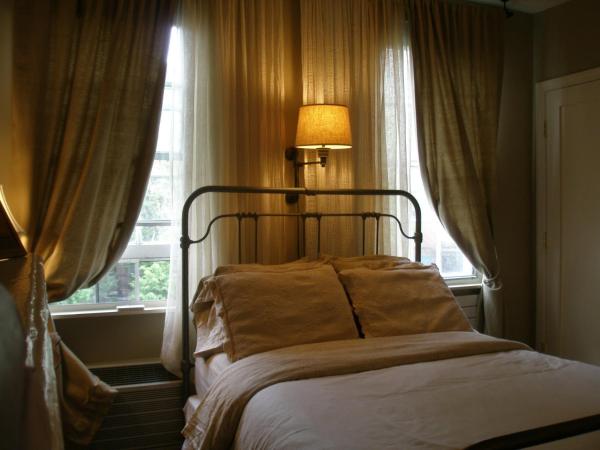 Incentra Village Hotel : photo 2 de la chambre studio inde avec grand lit et kitchenette