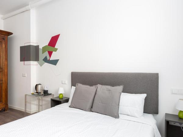 Ronda9 central suites : photo 6 de la chambre chambre lit queen-size deluxe