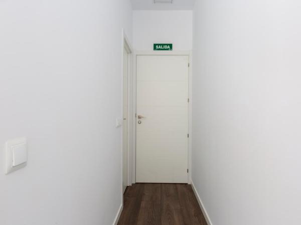 Ronda9 central suites : photo 8 de la chambre chambre double - vue sur jardin