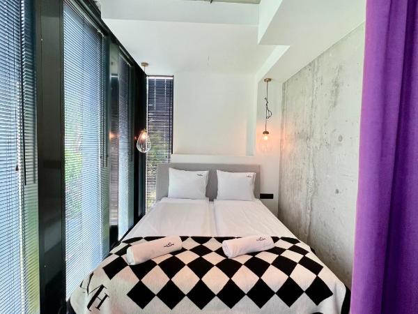 NEON APARTMENTS : photo 1 de la chambre appartement supérieur