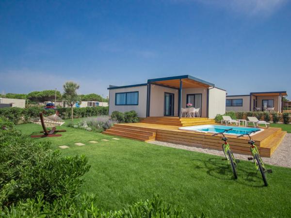 Arena Grand Kazela Camping Homes : photo 7 de la chambre villa camping deluxe avec piscine privée